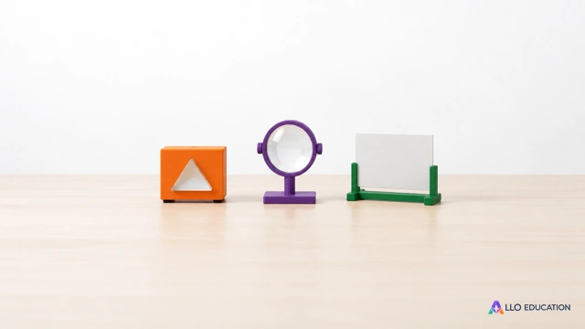 Petit bloc orange, lentille circulaire violette et écran blanc vert évoquant la formation d’une image dans un montage fictif.